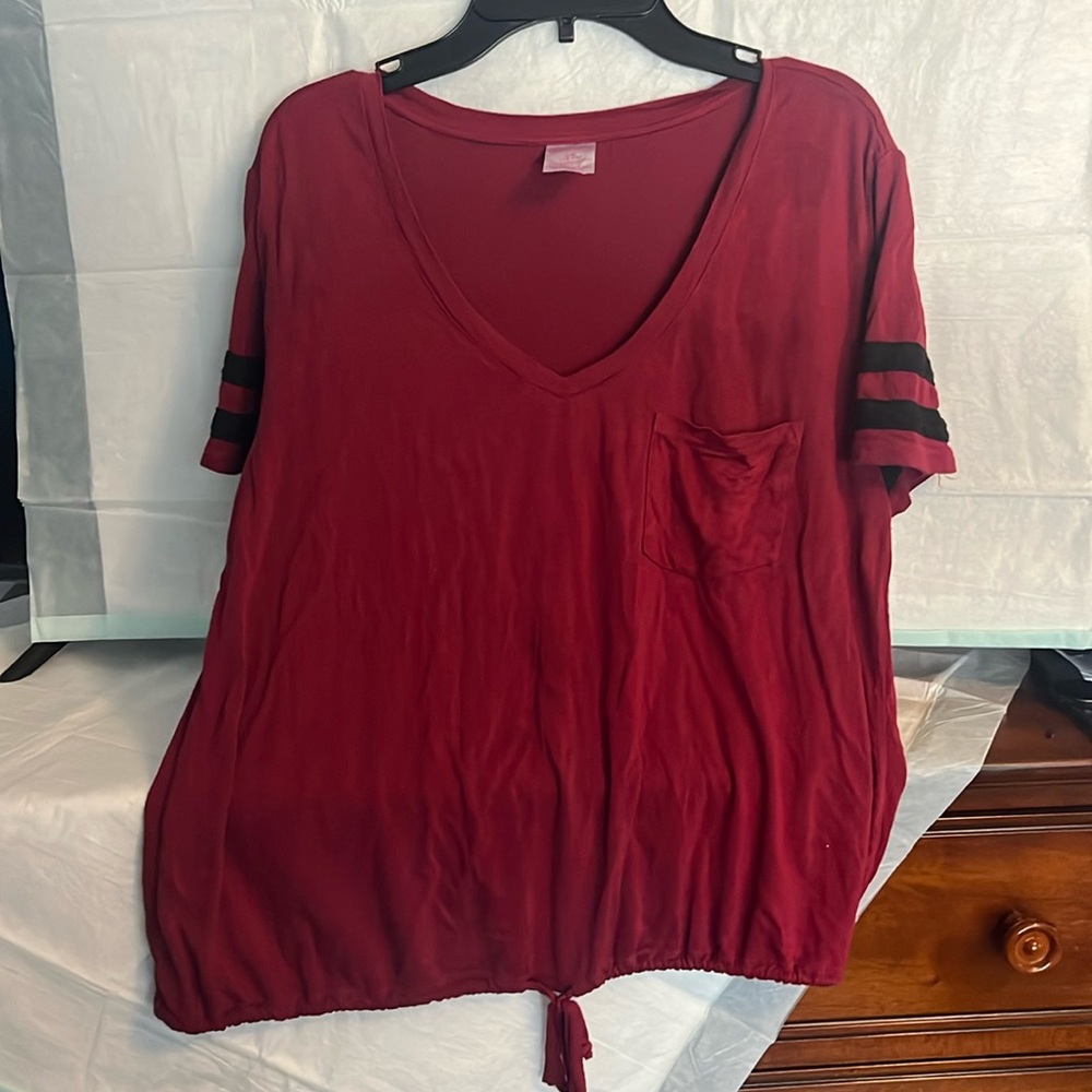No boundaries V Neck burgundy shirt with a pocket and black strips